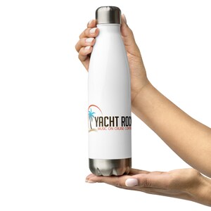 May include: White stainless steel water bottle with a logo that says "YACHT ROCK MUSIC ON CRUISE CONTROL" with a palm tree graphic.