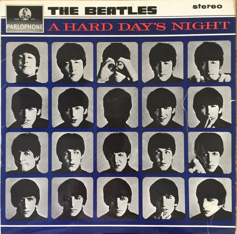 May include: A vintage vinyl record album cover featuring a grid of 20 black and white photos of the Beatles band members. The album title is "A Hard Day's Night" and the band name is "The Beatles" in large white letters. The record label is "Parlophone" and the album is "stereo".