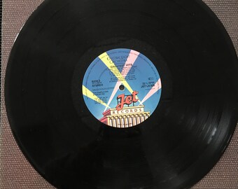 E.L.O グレイテスト・ヒッツ (LPレコード) 710vxSbxNUL._UF1000,1000_QL80_.jpg