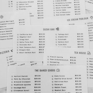May include: A collection of menus for a restaurant, featuring a variety of food and drink options. The menus are printed on white paper with black text and are laid out on a marble surface. The menus include items such as sandwiches, sushi, pizza, desserts, ice cream, and tea.