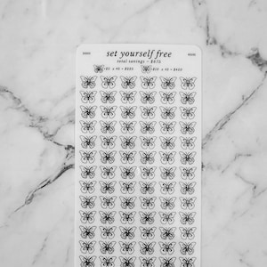 May include: A sheet of clear sticker paper with black butterfly outlines. The text "set yourself free" and "total savings - $675" is printed at the top of the sheet. The text "f.ly. || first love yourself" is printed at the bottom of the sheet.