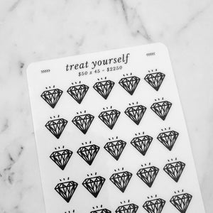 May include: A sheet of clear sticker paper with 45 black diamond stickers. The text "treat yourself" and "£50 x 45 = £2250" is printed on the sheet.