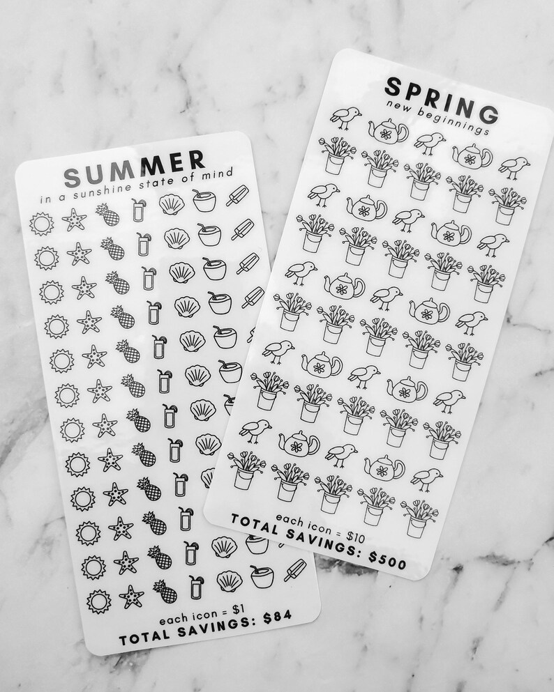 May include: Two sheets of clear stickers with black outlines of various icons. The top sheet has a title "SPRING new beginnings" and features 36 icons of birds, flowers, and teapots. The bottom sheet has a title "SUMMER in a sunshine state of mind" and features 36 icons of suns, pineapples, seashells, and popsicles. The text "each icon = $10 TOTAL SAVINGS: $500" is on the top sheet and the text "each icon = $1 TOTAL SAVINGS: $84" is on the bottom sheet.