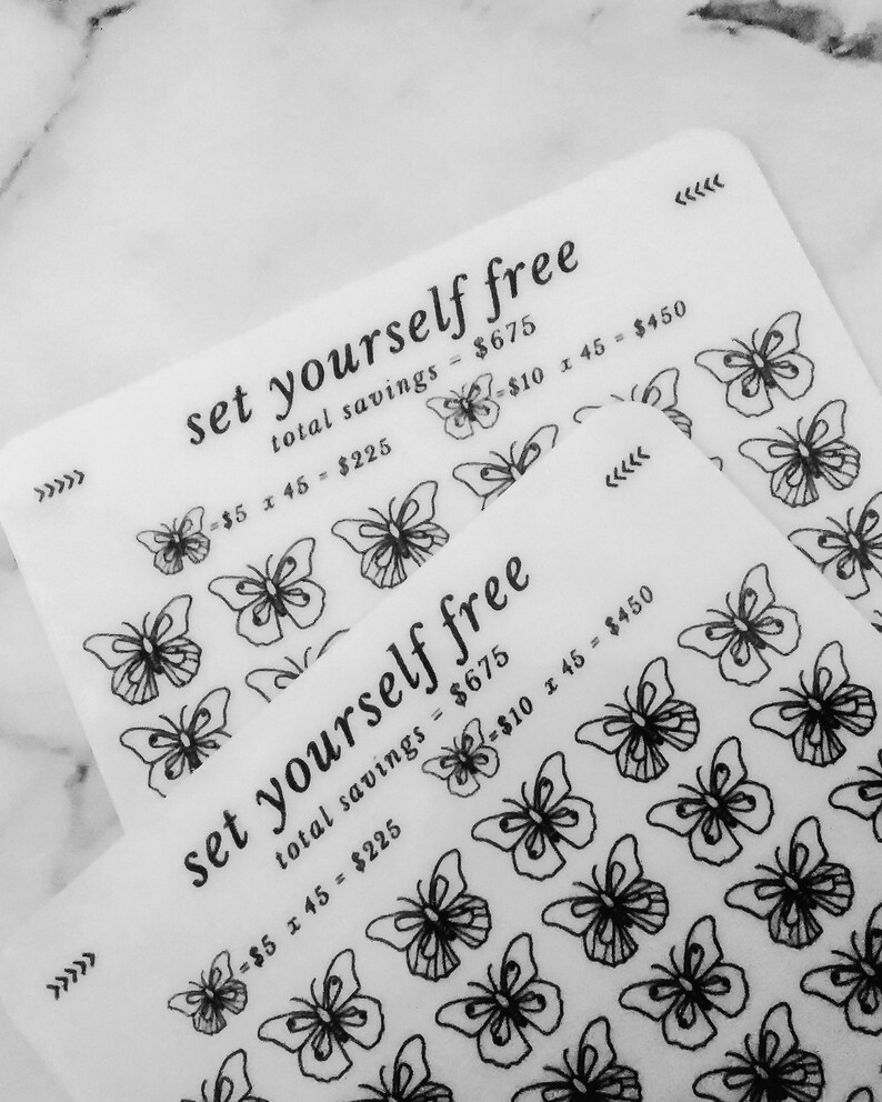 May include: Two sheets of clear sticker paper with black butterfly designs and the text "set yourself free" and "total savings = $675". The text also includes the equations "$5 x 45 = $225" and "$10 x 45 = $450".