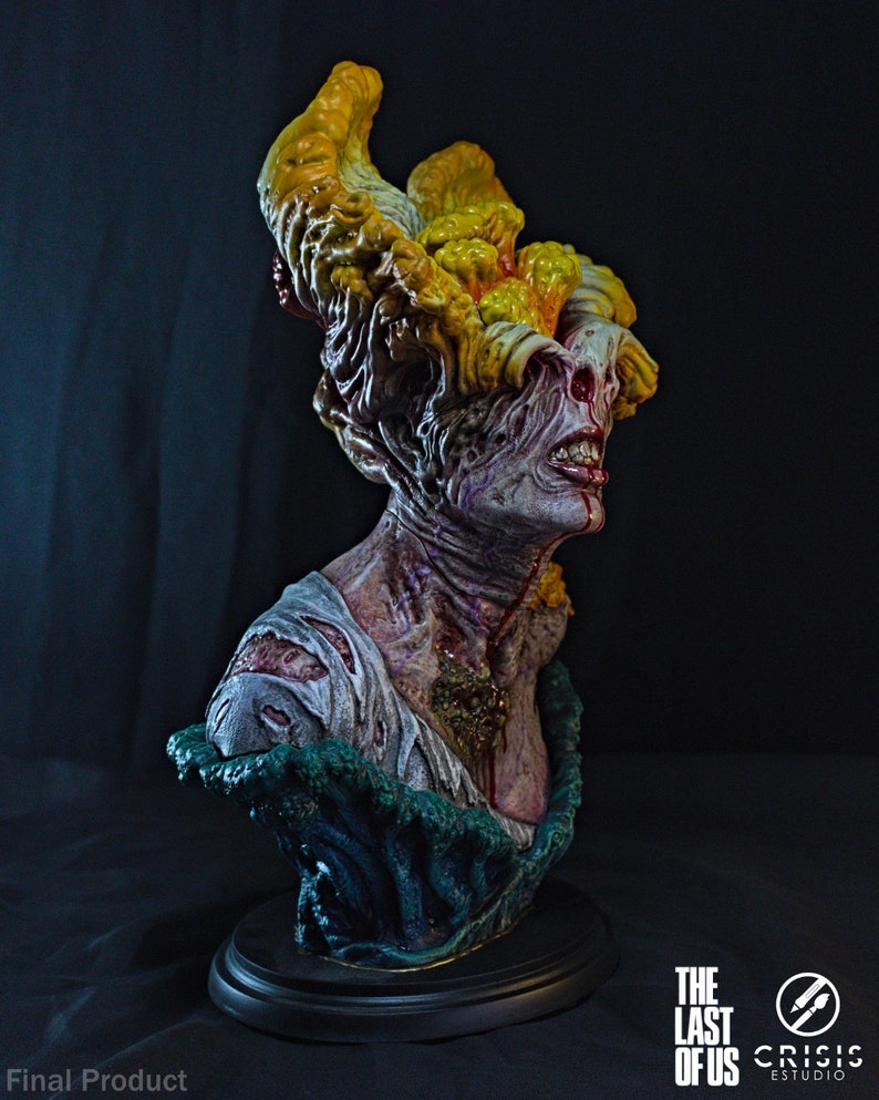 May include: A detailed bust of a Clicker from The Last of Us, featuring a grotesque, fungal-covered head and exposed flesh. The sculpture is painted with realistic colors and textures, mounted on a black base. The Final Product logo is visible.
