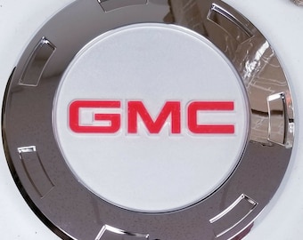 GM Accessories 88963140 Button Style Center Caps in Bright Polished Finish with Red GMC Logo GM Accessories 88963140 Button Style Center Caps in Bright Polished Finish with Red GMC Logo