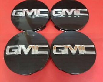 GM Accessories 88963140 Button Style Center Caps in Bright Polished Finish with Red GMC Logo GM Accessories 88963140 Button Style Center Caps in Bright Polished Finish with Red GMC Logo