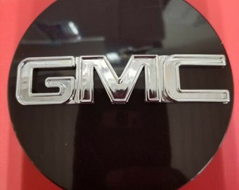 GM Accessories 88963140 Button Style Center Caps in Bright Polished Finish with Red GMC Logo GM Accessories 88963140 Button Style Center Caps in Bright Polished Finish with Red GMC Logo