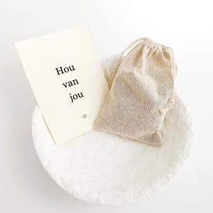 Kaart van handgeschept papier met leuke tekst