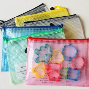 6 pochettes d'apprentissages pour les enfants de 2 à 6 ans, jeux de voyage à emporter partout, activités Montessori idéales pour apprendre.