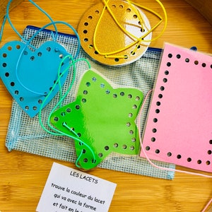 gioco di apprendimento dell'allacciatura che sviluppa la motricità fine, attività educativa per bambini dai 2 ai 6 anni, gioco ispirato al metodo Montessori,