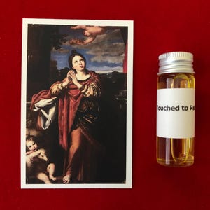 Heilige Agnes devotional relikwie heilige oliepakket (aangeraakt door een relikwie van de heilige Agnes van Rome)