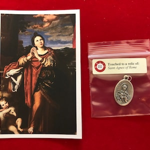 Relikwie-medaillepakket heilige Agnes van Rome: heilige kaart en medaille met relikwie van de derde klas (aangeraakt door relikwie van St. Agnes)