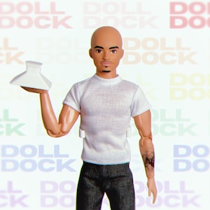 Doll Dock – Sistema modular de exhibición en pared para muñecas y figuras