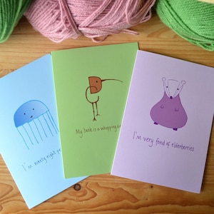 Conjunto de três cartas de animais
