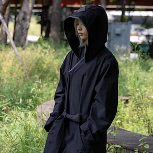 Modern Hanbok Raincoat, Black Hooded Korean Durumagi Trench Coat, Waterproof Outerwear with Reflective Korean Symbol Design