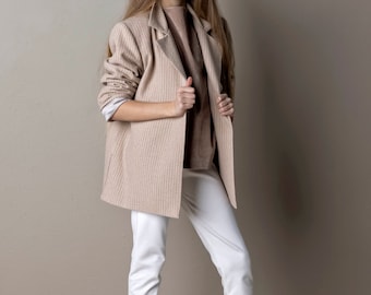 Short wool trench spring coat or jacket for a girl.