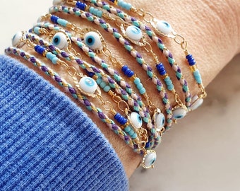 Bracelet lien multi rang chaine perles oeil protection cordon multi tour acier inoxydable perles bleu blanc or sautoir réglable