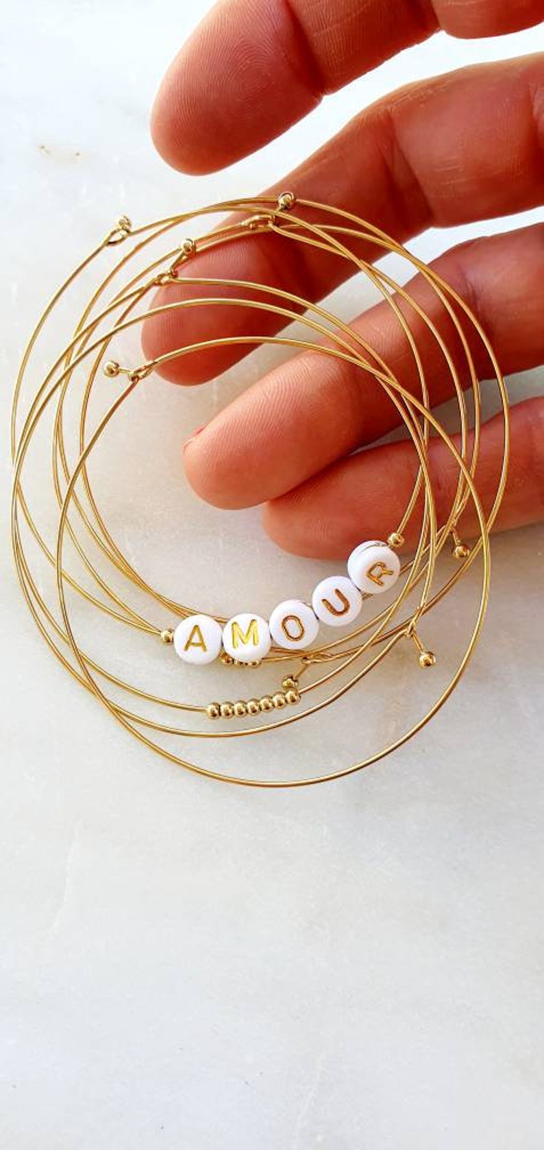 Semainier or, ensemble de 7 bracelets couleur doré, jonc, bracelet femme, bangle, bracelet acier inoxydable, bracelets fins pour st valentin image 1