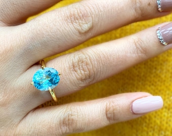 4.40カラットのスカイブルートパーズリング、12月の誕生石の繊細な