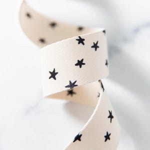Starry Webbing Natural with Black Stars for Moda and Stitch Supply Co. 1.5 inch. Sold By the Yard