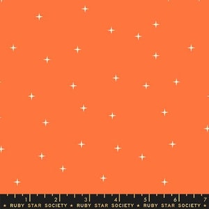 May include: A bright orange fabric with a white star pattern. The fabric is a repeating pattern of white stars on a solid orange background.