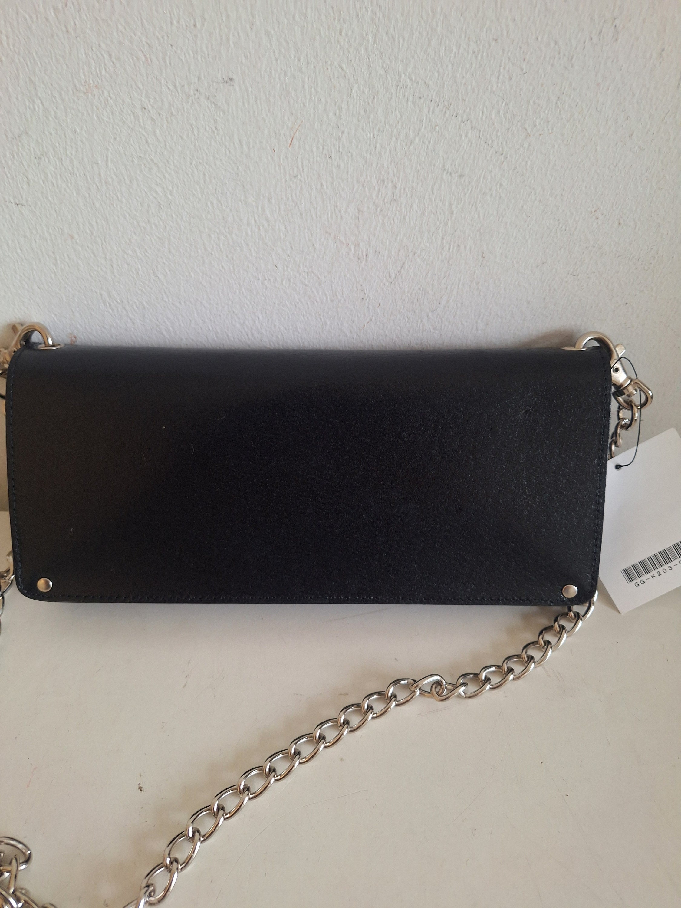 Comme de garcon chain 2025