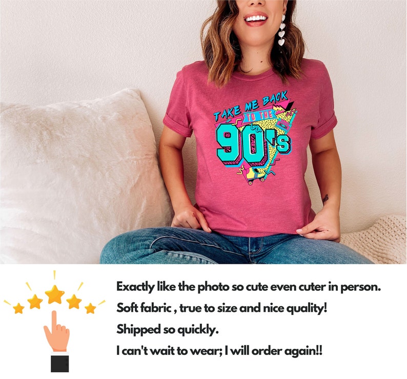 May include: A maroon t-shirt with the text "TAKE ME BACK TO THE 90'S" in teal, yellow, and pink. The graphic includes a boombox, roller skates, and a leopard print design. The shirt is worn by a person.