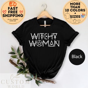 May include: Black t-shirt with white text that reads "Witchy Woman" and includes a pentagram and other symbols.