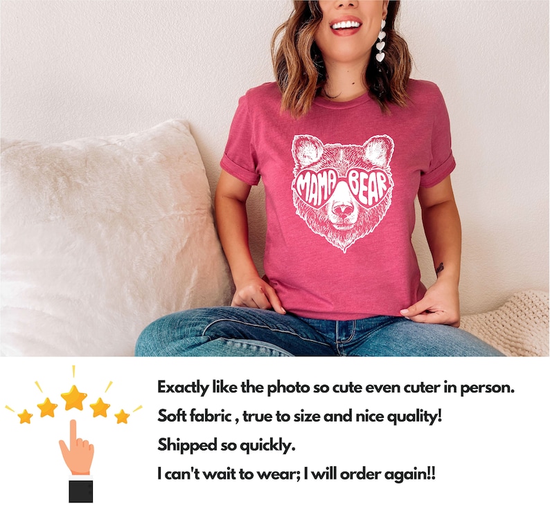 Puede incluir: Una camiseta rosa con un gr&aacute;fico blanco de un oso con gafas de sol en forma de coraz&oacute;n y el texto "Mama Bear".
