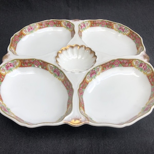 A rare find: a large porcelain dish for serving snacks in 4 sections produced by the Limoges manufactory William Guerin, 1900-1930, France