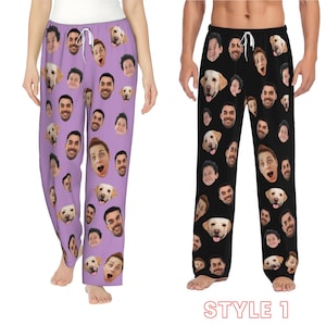 May include: Two pairs of pyjama trousers with a purple and black background. The trousers are covered in a pattern of faces and dogs. The text "STYLE 1" is at the bottom of the image.