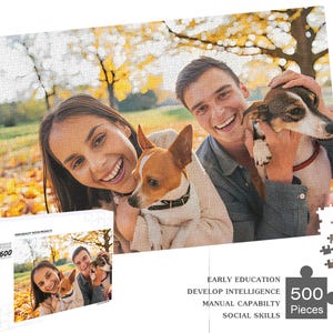 May include: A 500 piece jigsaw puzzle featuring a family with two dogs in a fall setting. The puzzle box has the text "Early Education, Develop Intelligence, Manual Capability, Social Skills" and "500 Pieces".
