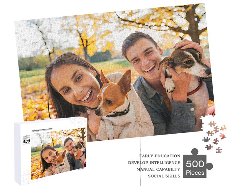 May include: A 500 piece jigsaw puzzle featuring a family with two dogs in a fall setting. The puzzle box has the text "Early Education, Develop Intelligence, Manual Capability, Social Skills" and "500 Pieces".