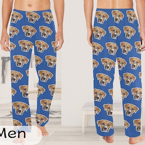 May include: Blue pajama pants with a repeated pattern of a dog's face.