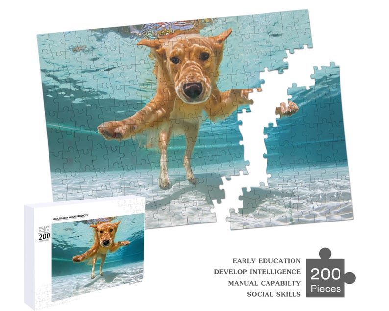 May include: A 200-piece jigsaw puzzle featuring a golden retriever dog swimming underwater in a pool. The puzzle is made of cardboard and has a blue and white background.