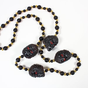 Four Gorillas with Red Eyes Bead
