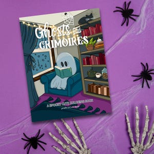 May include: A coloring book titled "Ghosts and Grimoires" featuring a cartoon ghost reading in a blue armchair. The cover art includes a bookshelf, a cat, and the text "A Spooky Cute Coloring Book". The background is purple with spiderwebs and plastic spiders.