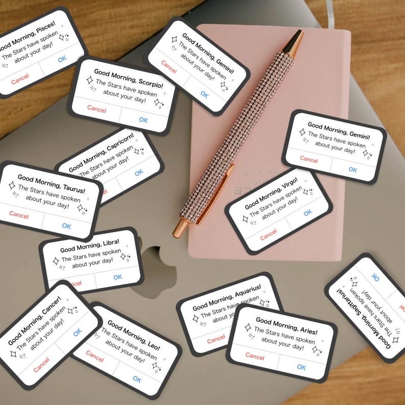 a sticker reminiscent of an iPhone alert, but it says, good morning, Gemini or other zodiac sign, the stars have spoken about your day! in reference to zodiac academy perfect for adding bookish flair to your kindle or laptop