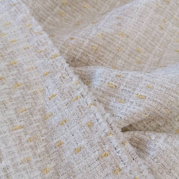 Off-white bouclé fabric with golden lurex thread, light tweed fabric for jackets, skirts and dresses
