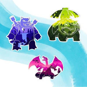 May include: Three colorful stickers featuring Pokemon characters, each with a silhouette of a landscape behind them. The first sticker is a purple and blue Blastoise with a nighttime scene. The second sticker is a green Venusaur with a jungle scene. The third sticker is a pink and purple Charizard with a sunset scene.