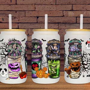 May include: Three white glass tumblers with bamboo lids and straws, each featuring a Halloween-themed design. The designs include cartoon villains, pumpkins, and the text "Villains Unite".