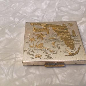 Compacte vintage kaart van Florida, gebruikt als souvenir