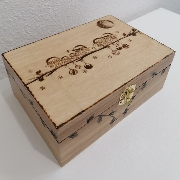 Cute family of little owls engraved wooden box and outline of a fir branch with pine cones