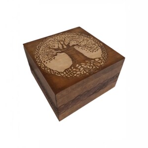 May include: A wooden box with a Celtic tree of life design carved into the lid. The box is brown and has a natural wood finish.
