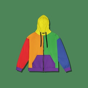 May include: A zip-up hoodie featuring a vibrant color-blocked design. The hood is bright yellow with black drawstrings. The front panels are orange and green, the sleeves are red and blue, and the front kangaroo pocket is purple with a black zipper.