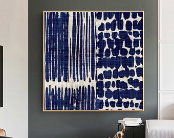 May include: Abstract art print with a blue and white geometric pattern. The print is framed in a gold frame.