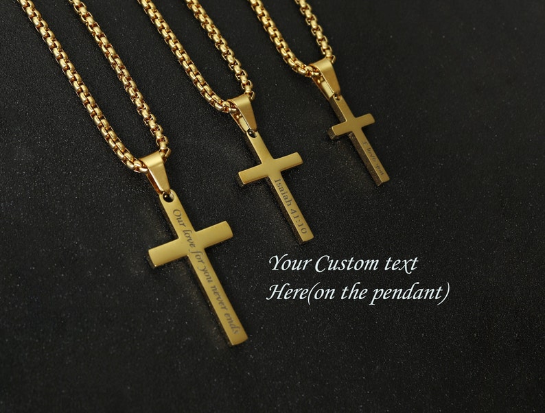 May include: Three gold chain necklaces with cross pendants. The cross pendants are engraved with the text "Our love for you never ends", "Isaiah 41:10", and "Your Custom text Here(on the pendant)".