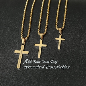 May include: Three gold chain necklaces with cross pendants. The crosses are engraved with the text "Our love for you never ends", "Isaiah 41:10", and "I love you". The text "Add Your Own Text Personalized Cross Necklace" is printed below the necklaces.