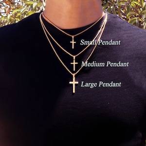May include: Three gold chain necklaces with cross pendants of different sizes. The smallest cross is labeled "Small Pendant", the middle cross is labeled "Medium Pendant", and the largest cross is labeled "Large Pendant".